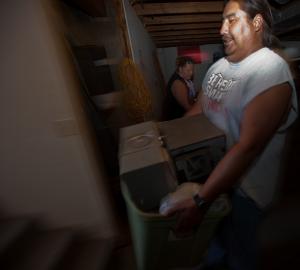 Retrieving property from a flooded basement.